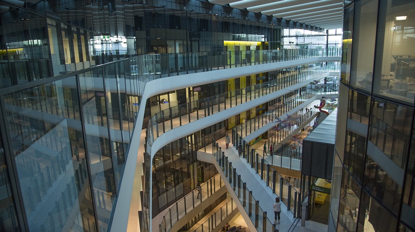 Interior of the MCRI; picture taken from an upper floor in an atrium-style area, many floors are visible below.