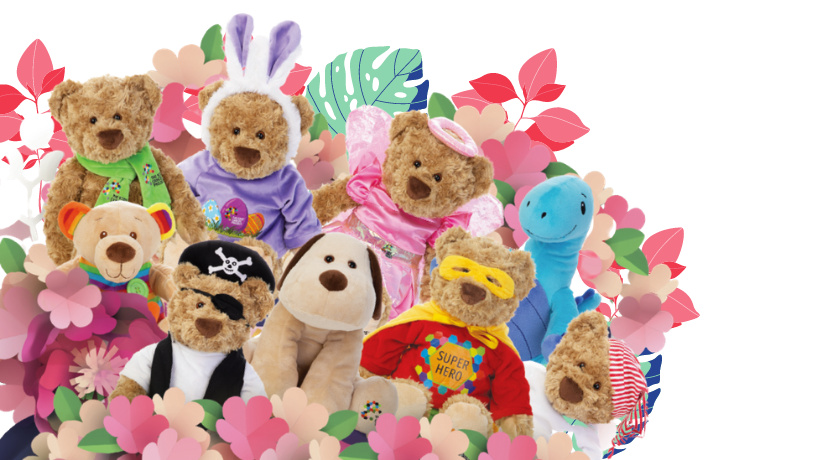 A selection of bright and colourful bears and other plush toys is pictured; the backdrop is white with floral designs.