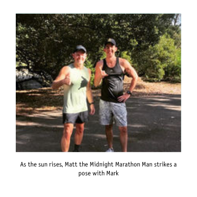 As the sun rises, Matt the Midnight Marathon Man strikes a pose with Mark