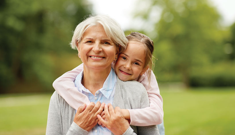 Sue and grandchild after making a decision to leave a gift in her will.