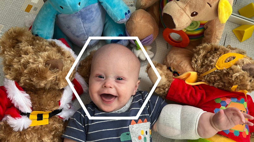 Smiling baby with bears
