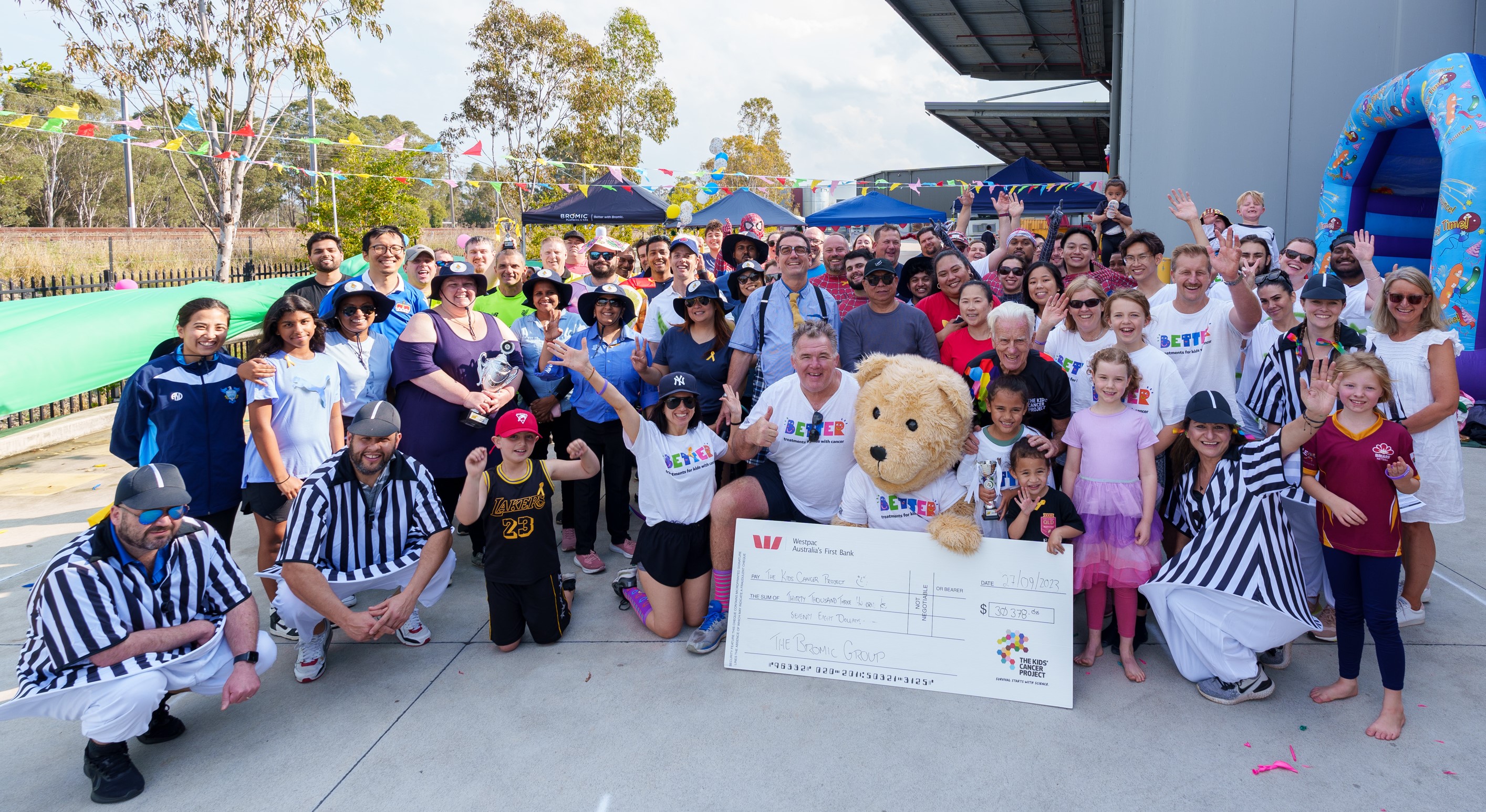 The Bromic team with Oscar raising funds with their back to school challenge