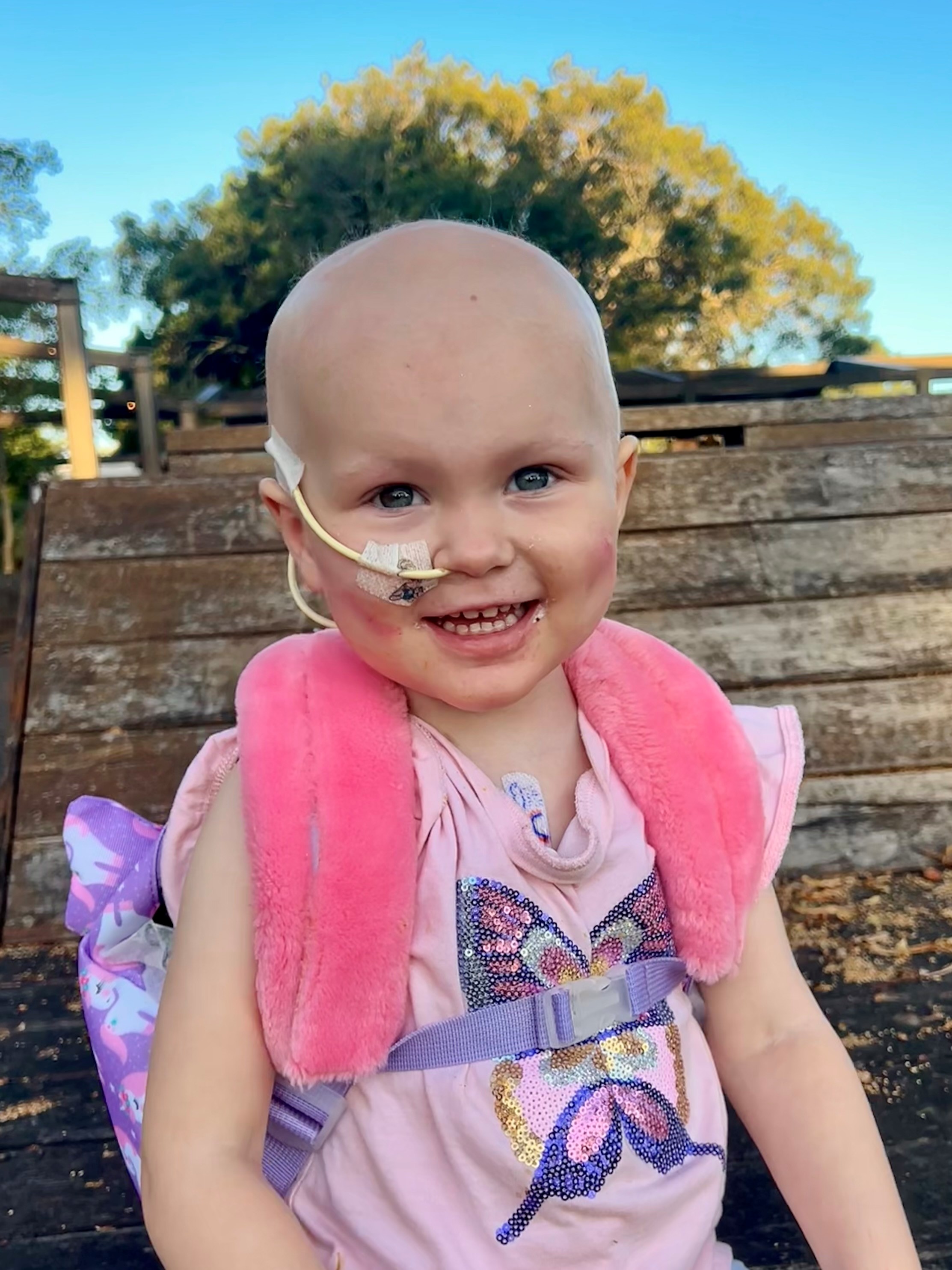 Charli with backpack