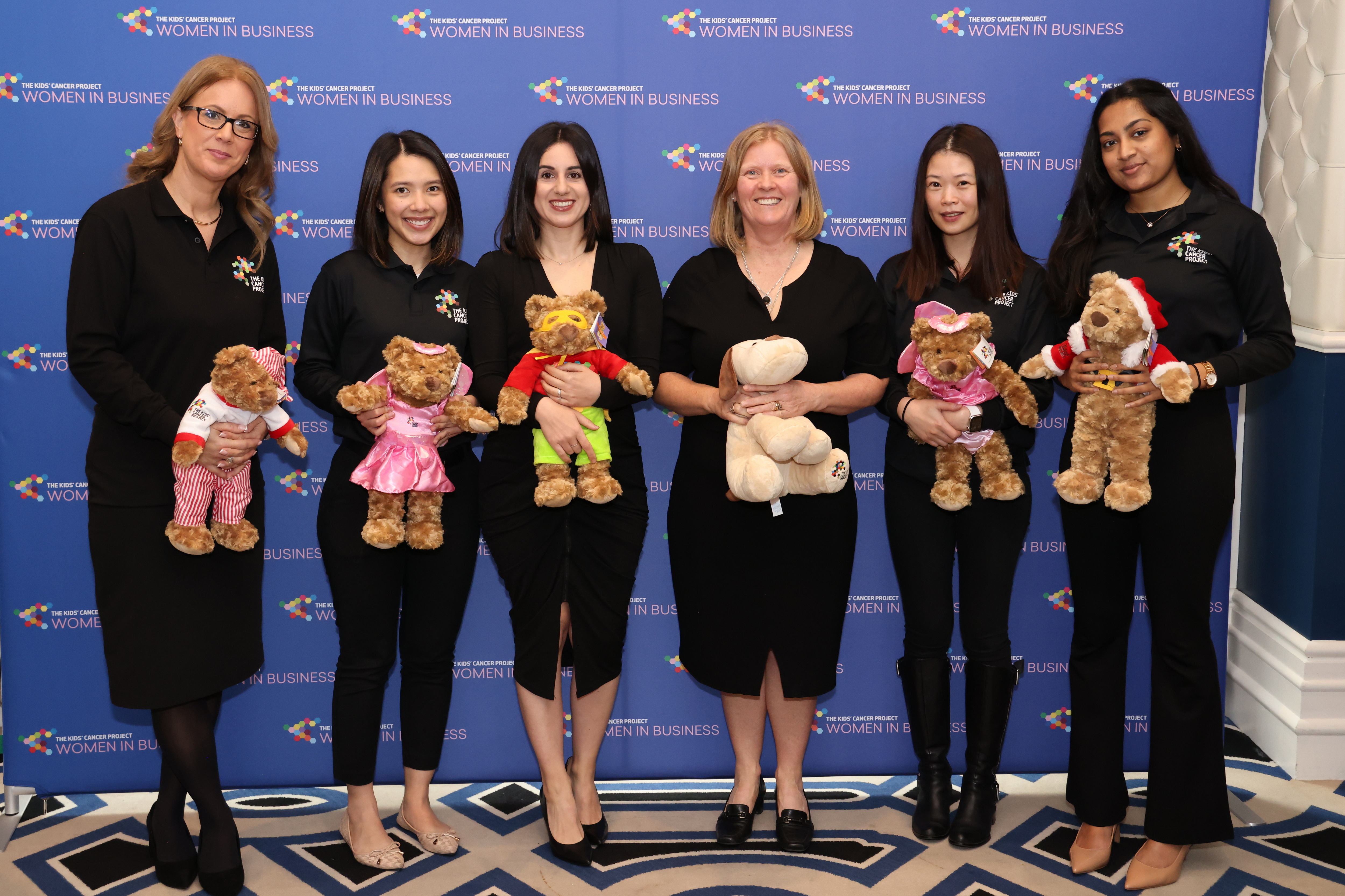 The Kids’ Cancer Project staff with SAS volunteers at a Women In Business event in May 2023